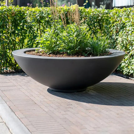 Jardinera redonda de poliéster de 200 x 40 cm.