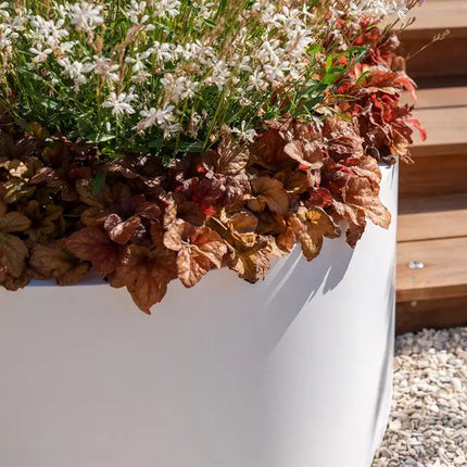 Jardinera ovalado de aluminio de 200 x 120 x 40 cm.