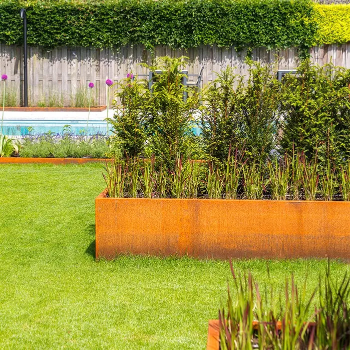 Jardinera en forma de L de acero Corten de 100 x 100 x 80 cm.